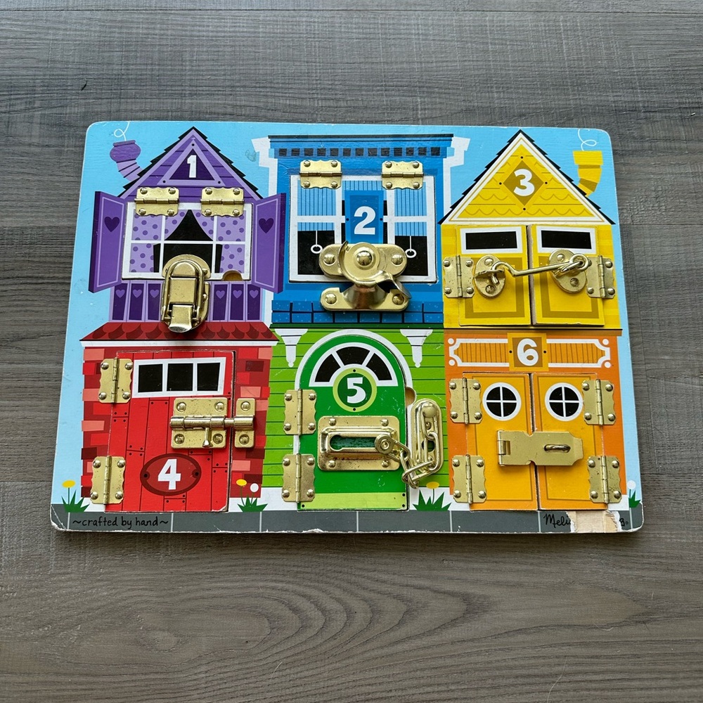 Melissa & Doug Latches Board